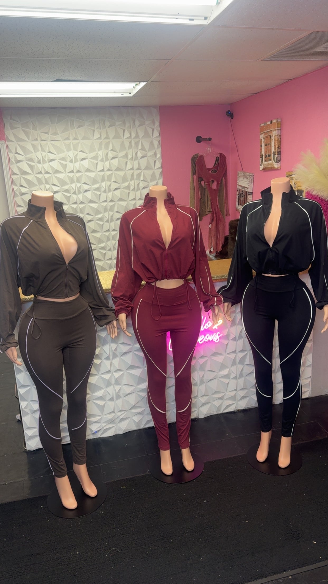 Zip up cropped jacket and matching high waisted leggings.